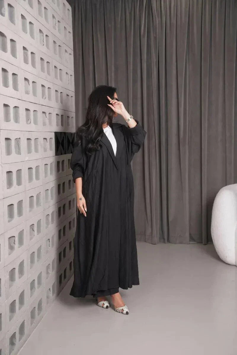 Woman wearing a free-size black linen blazer with wide fit and relaxed style indoors - free-size blazer