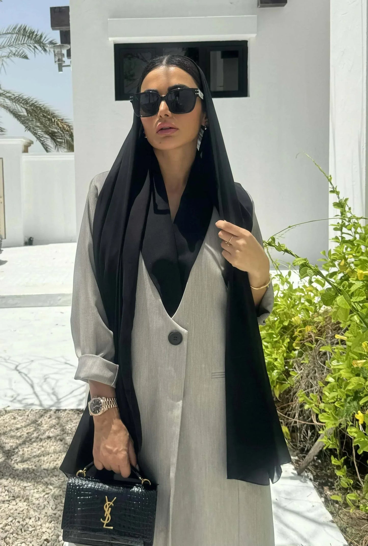 Modern gray crepe abaya with black collar, single button, and relaxed sleeves, styled with black hijab and handbag - Shadow Blend