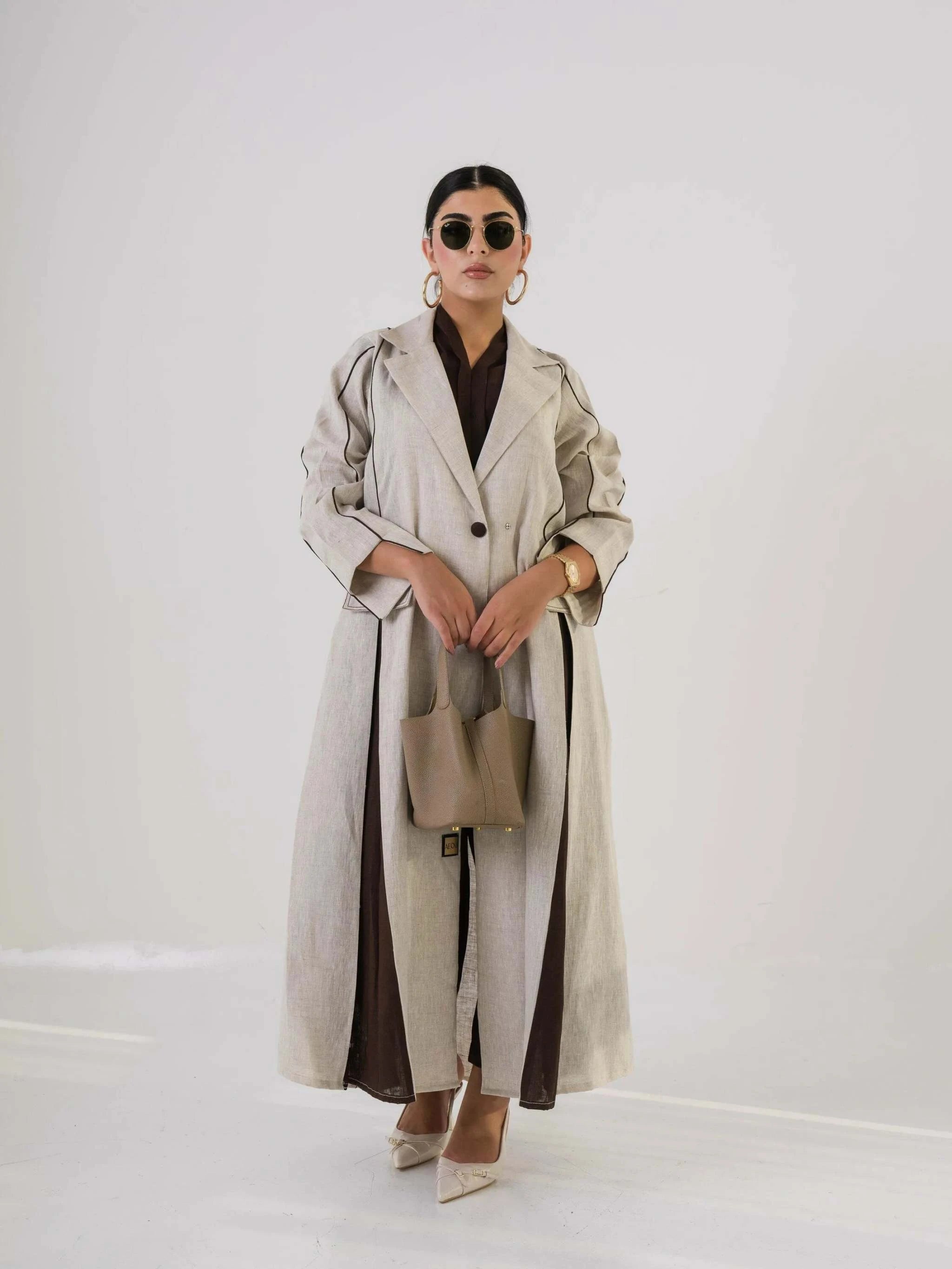 Fawn beige and brown linen blazer with clean lines for smart-casual and transitional layering
