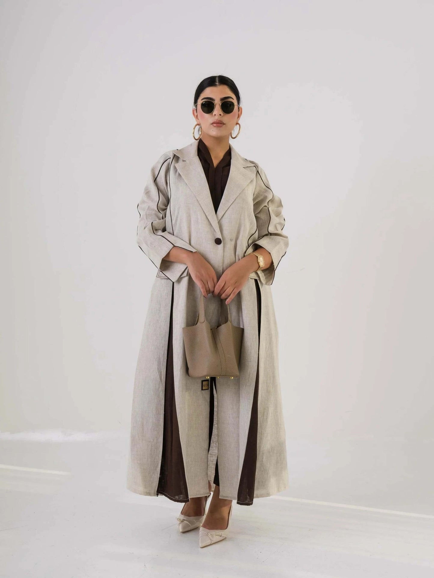 Fawn beige and brown linen blazer with clean lines for smart-casual and transitional layering