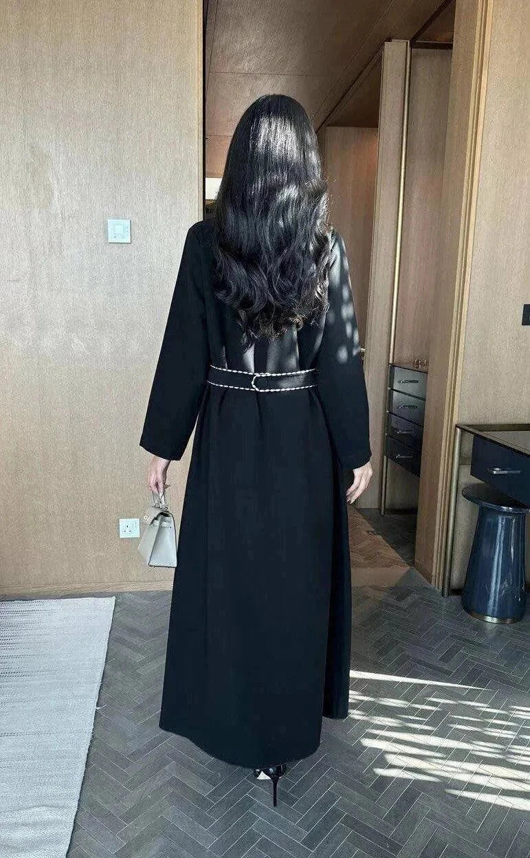 Modern black abaya with white line detailing in soft crepe fabric for everyday wear