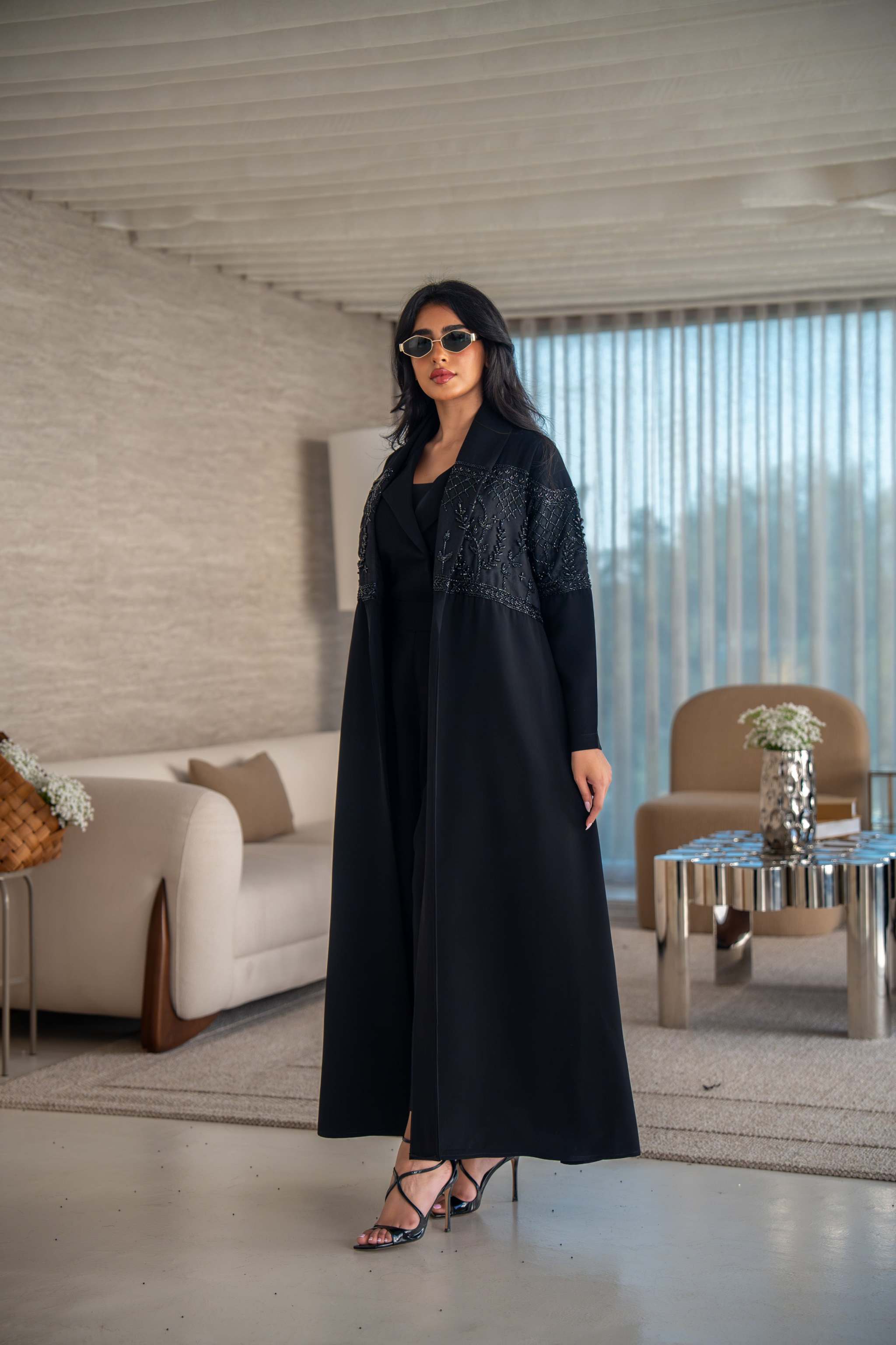 luxurious blend of crepe and satin fai abaya with intricate embroidery and soft drape
