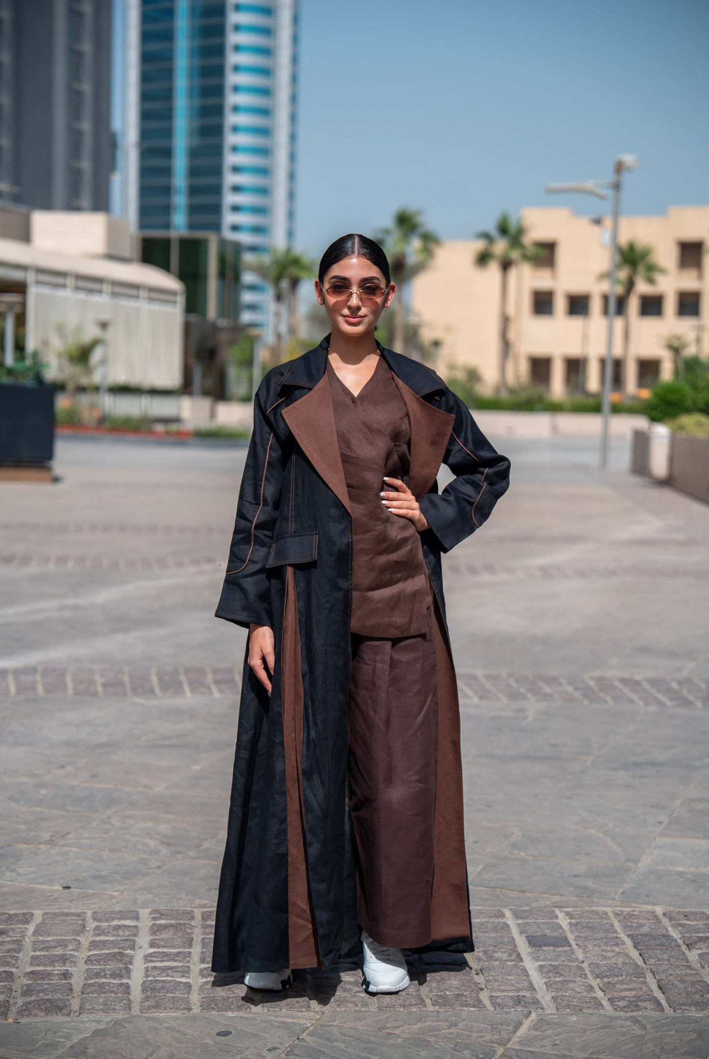 Modern Velora abaya in black and brown linen with wide lapels and structured street-style design