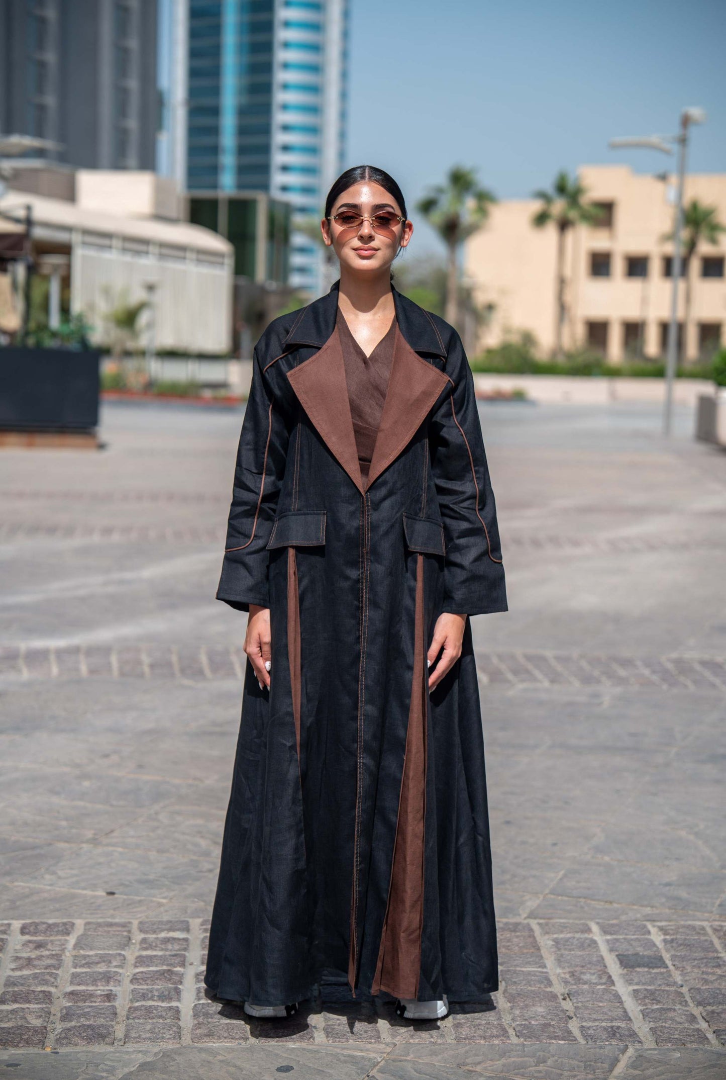 Modern Velora abaya in black and brown linen with wide lapels and street-style design