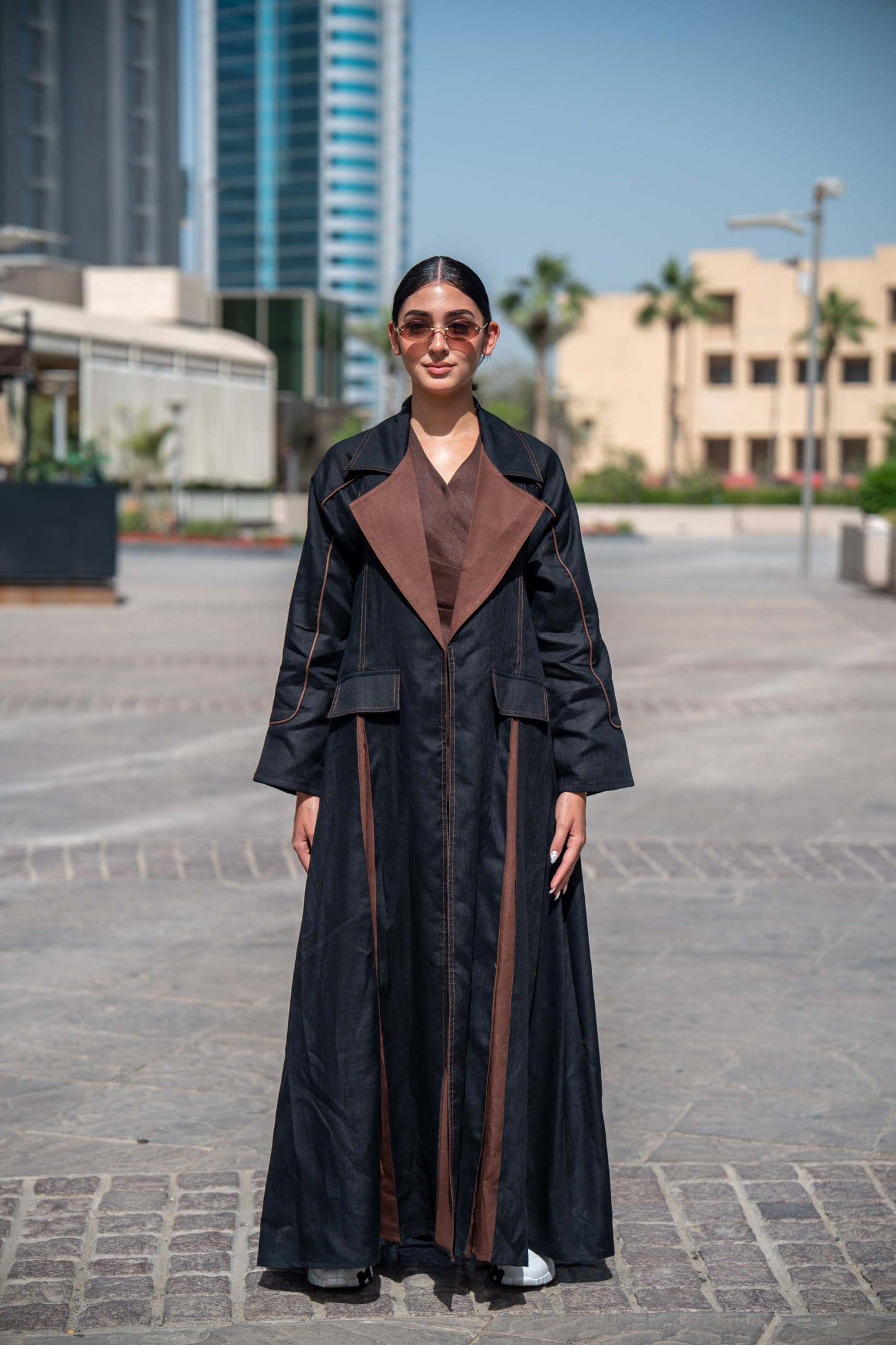 Modern Velora abaya in black and brown linen with wide lapels and structured street-style design