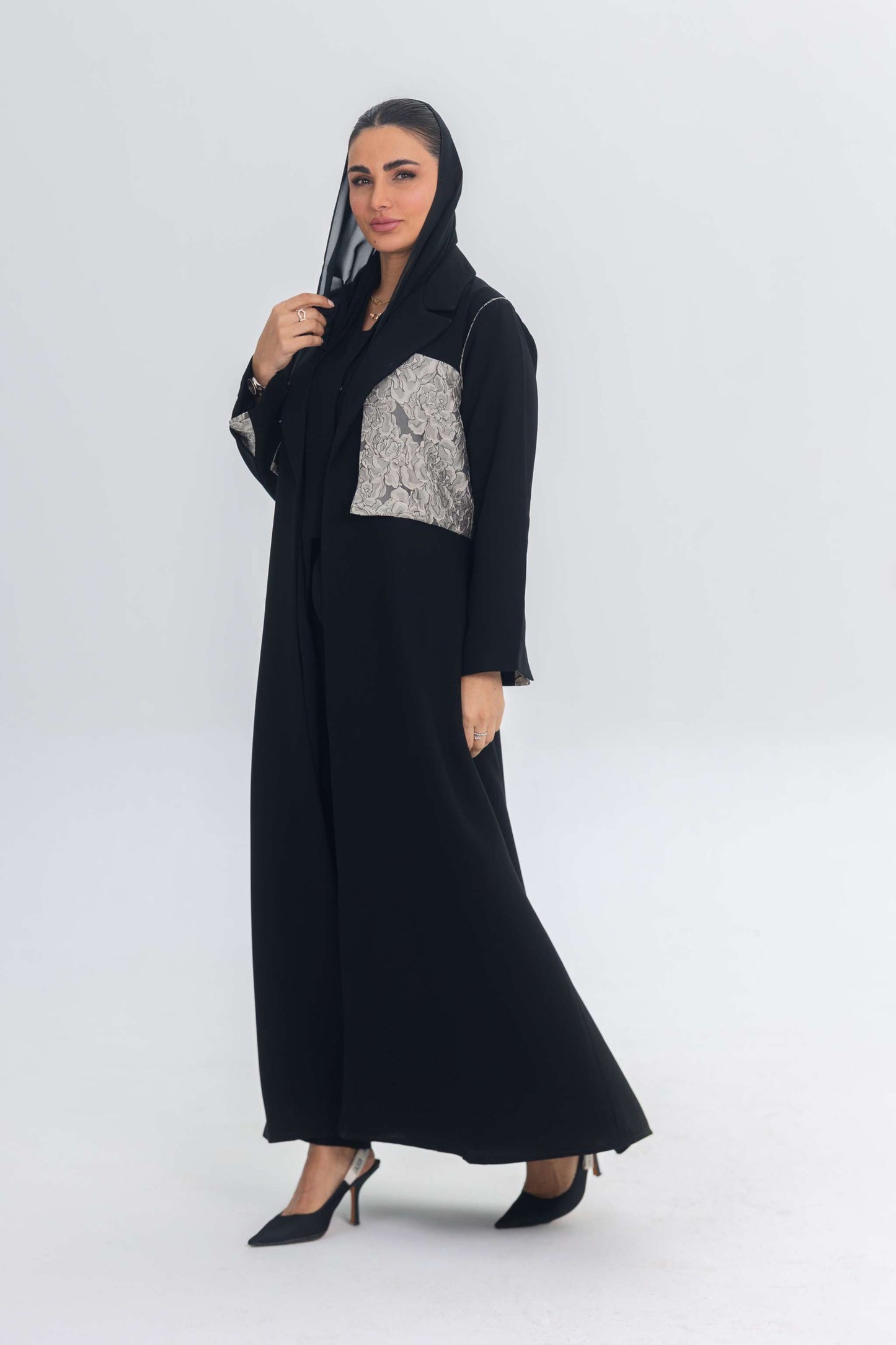 Elegant black crepe abaya with contrasting jacquard panel and flowing design