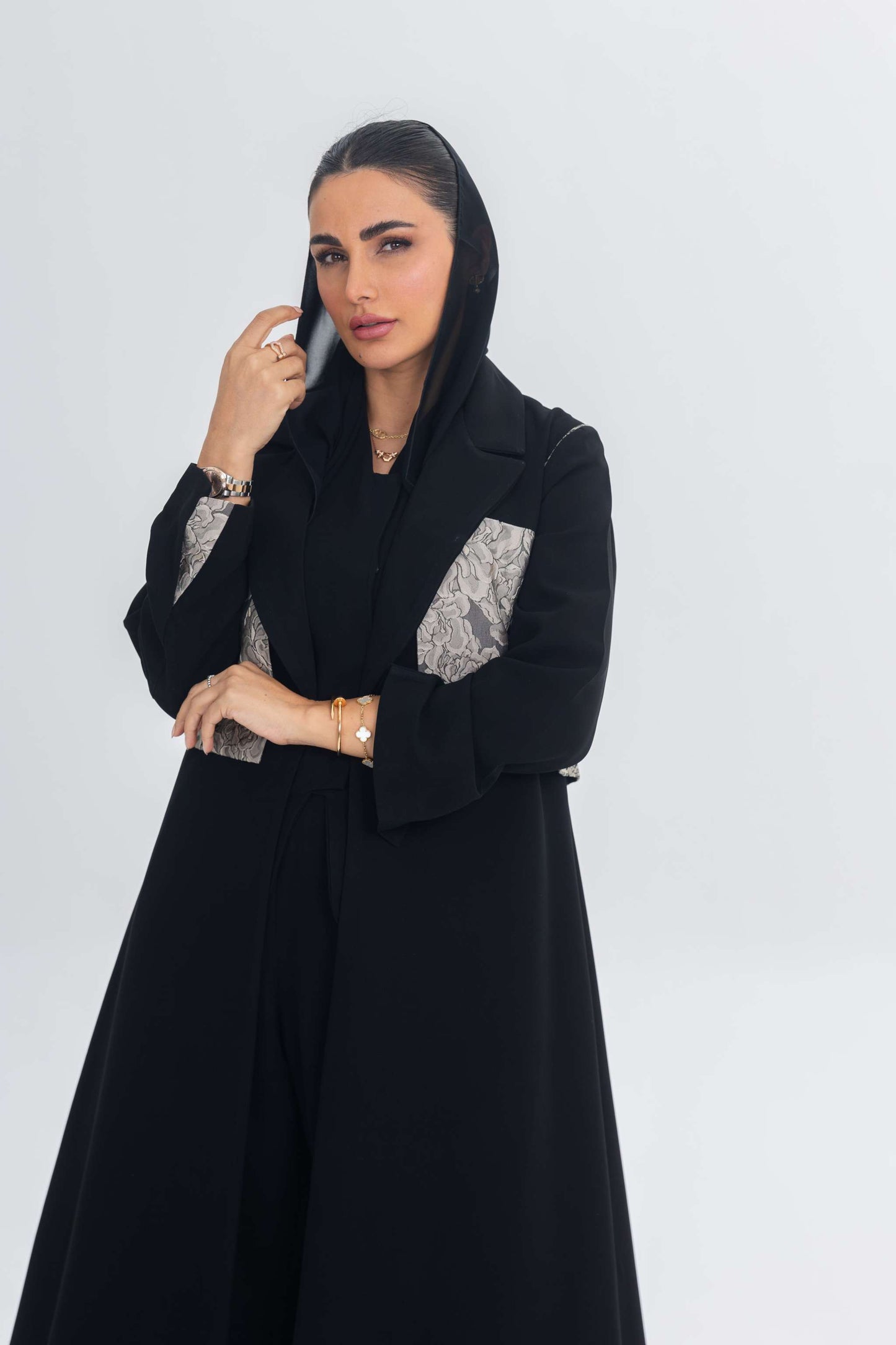 Elegant black crepe abaya with jacquard panel detailing and flowing fabric design