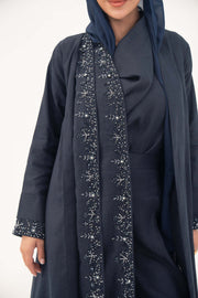 High-quality linen abaya with delicate shak beading on front panels and cuffs, open-front flowy design with structured shoulders