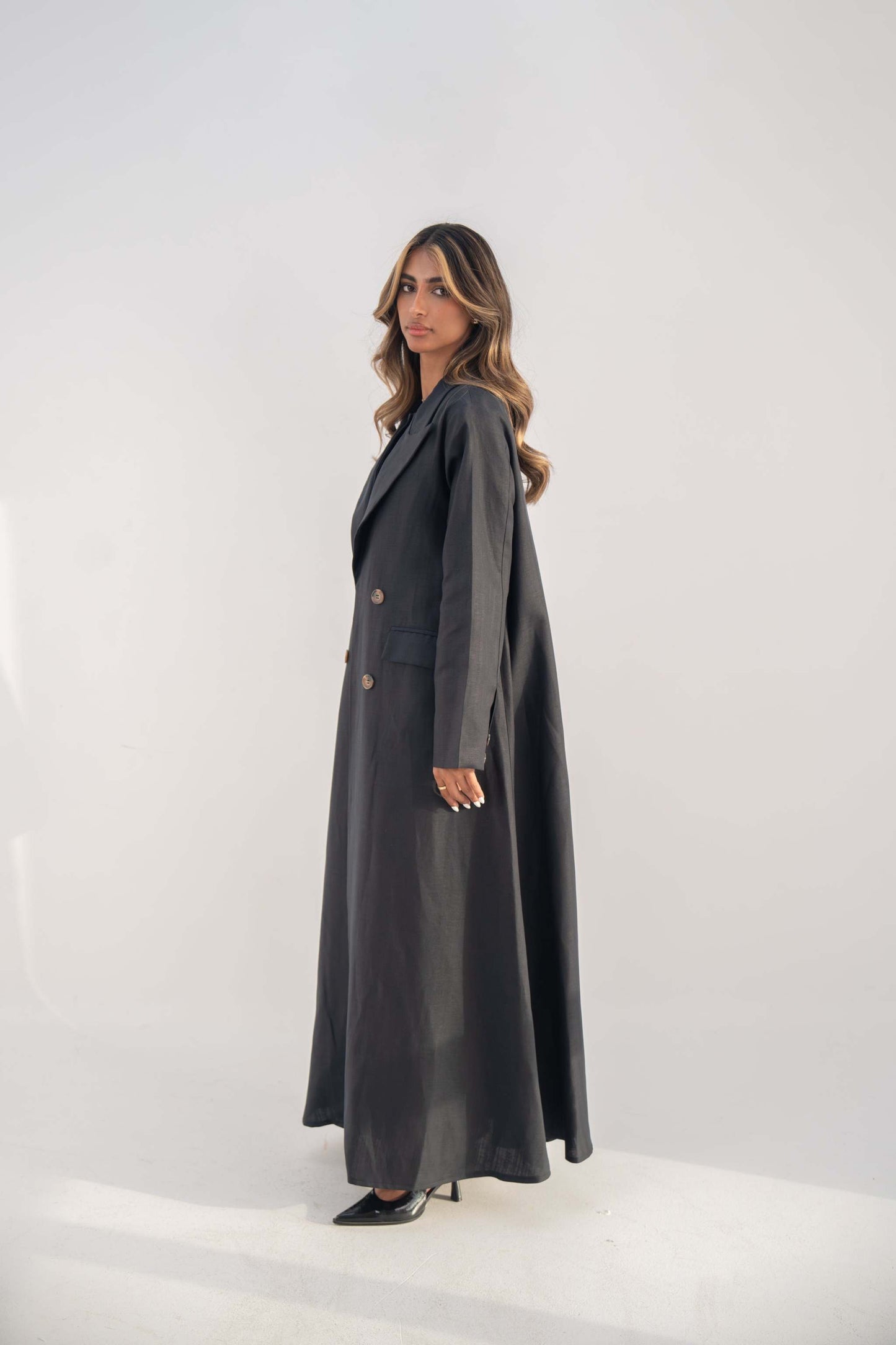 navy blue blazer abaya with double-breasted buttons and sharp lapel collar for a sleek silhouette