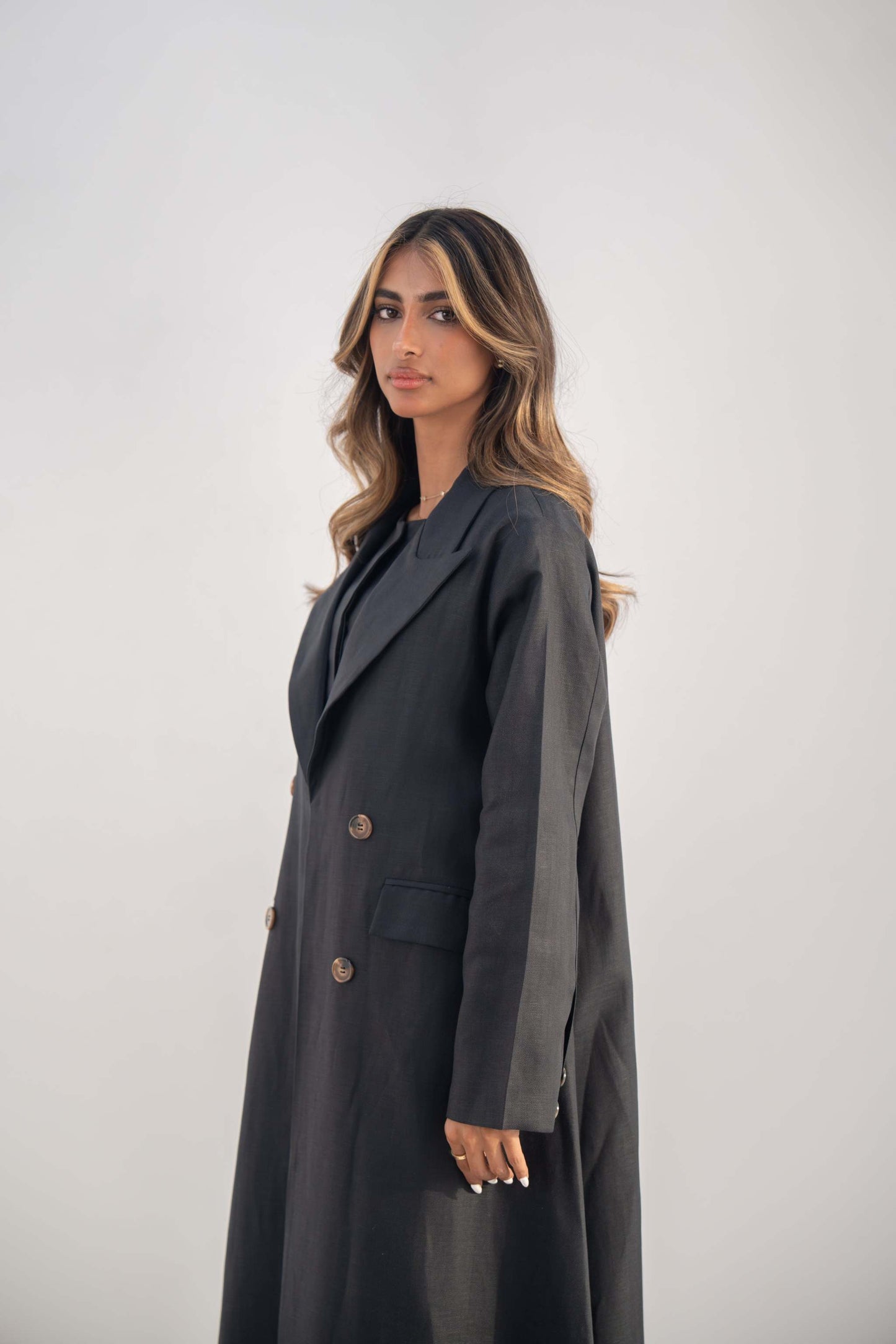 Navy blue double-breasted blazer abaya with sharp lapel collar and flap pockets in twill linen blend fabric
