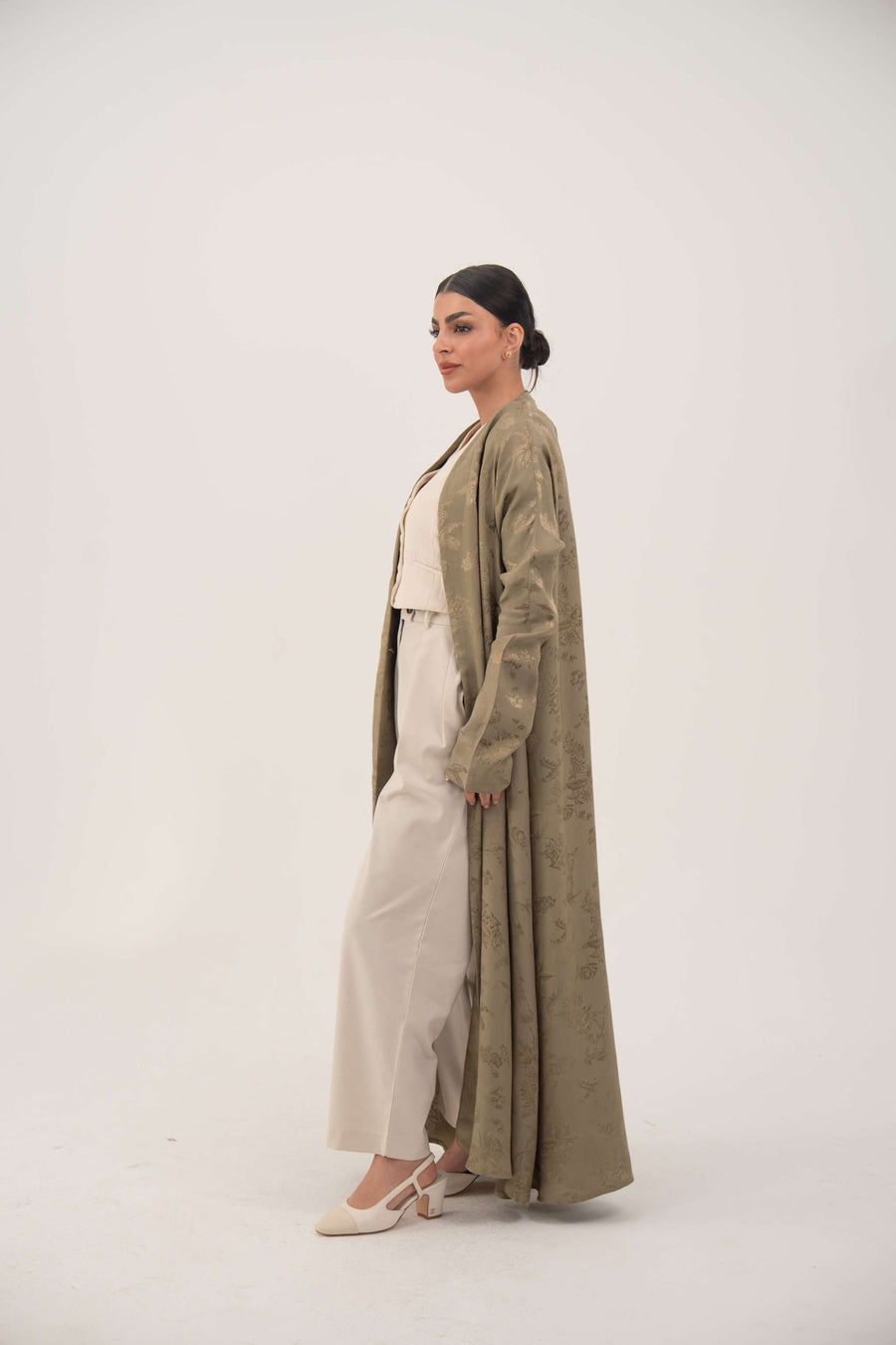 Elegant olive green silk abaya with open-front and ruched wrist sleeves for a sleek look