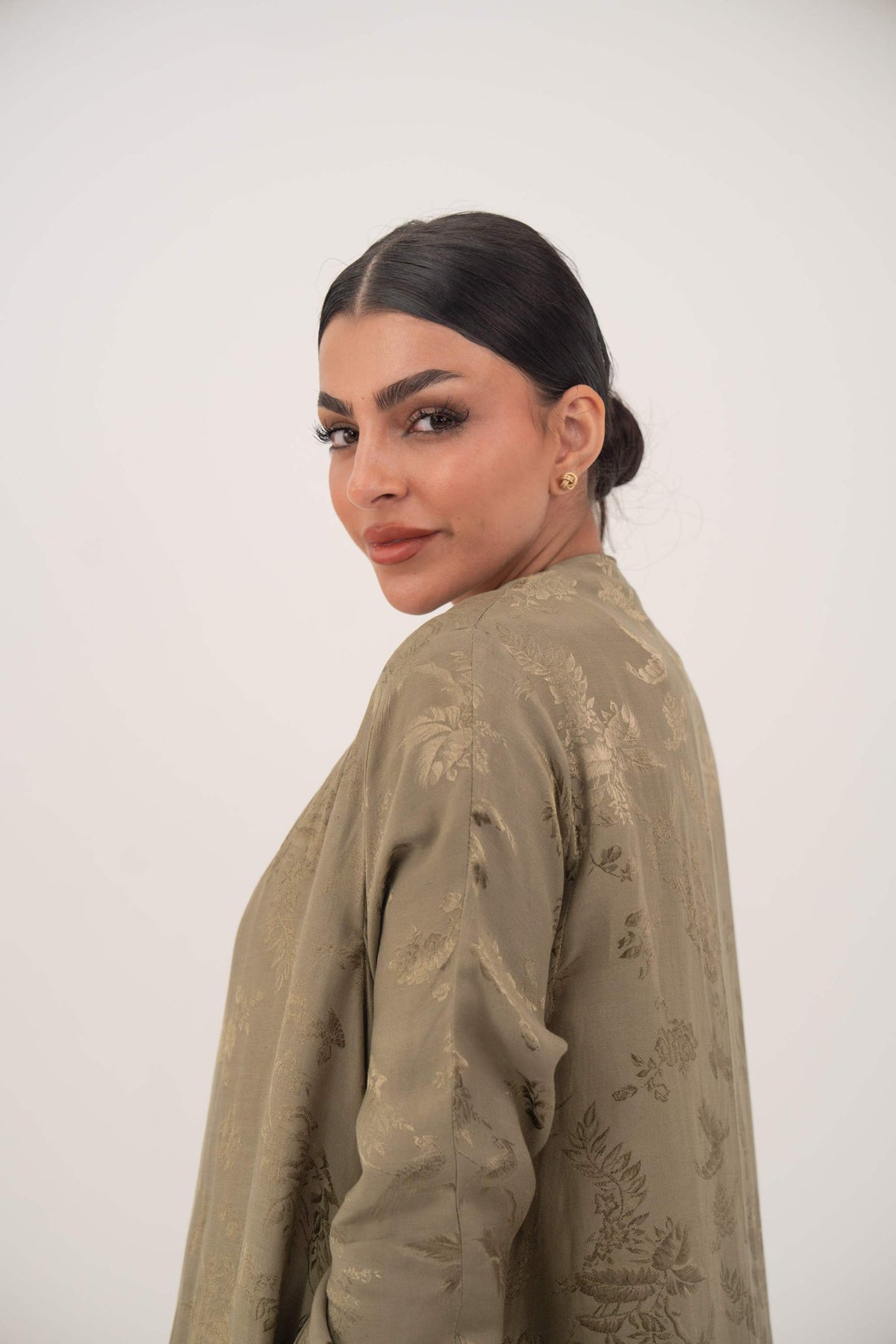 elegant olive green silk abaya with collarless open front and long ruched sleeves