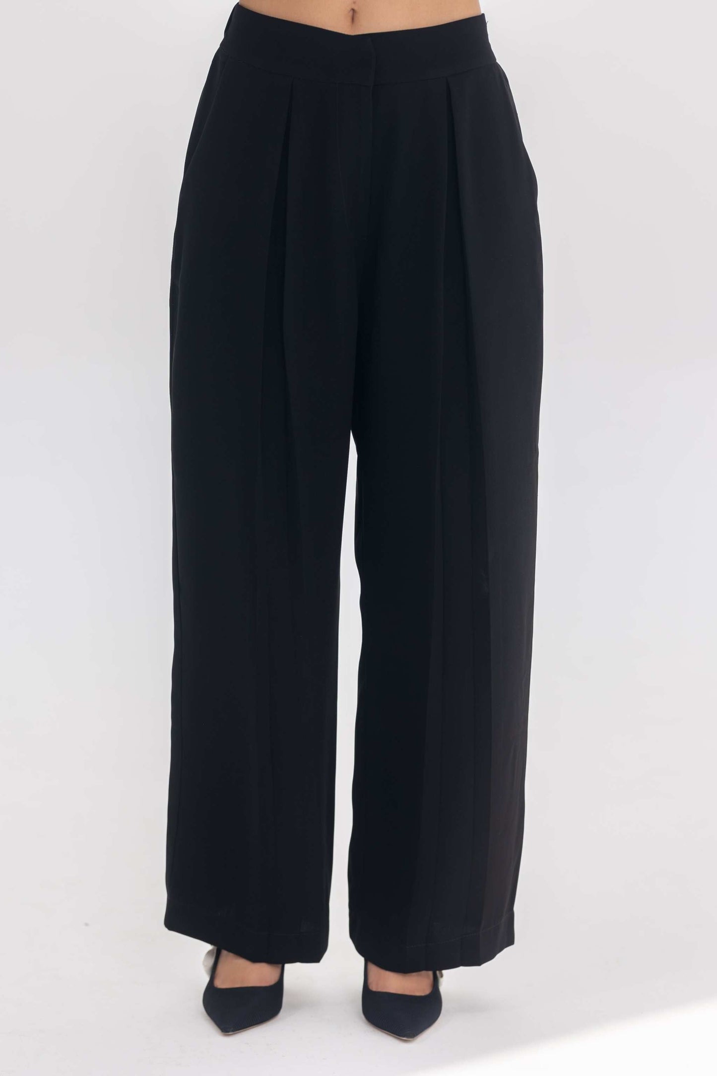 Black crepe wide-leg pants from the inner muse collection