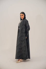Black silk open-front abaya with subtle abstract pattern and soft shimmer in charcoal gray