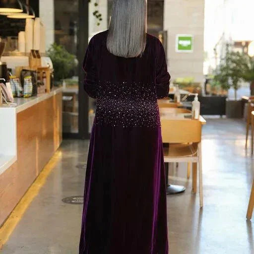 Elegant violet velvet Galaxy abaya with intricate hand embroidery and luxurious texture ideal for special occasions