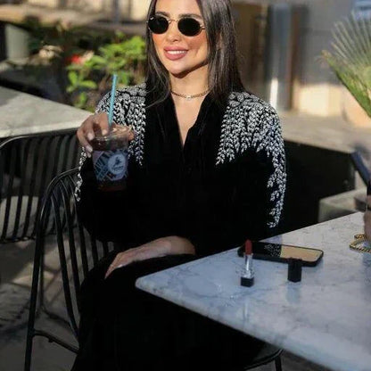 black velvet abaya with intricate white and silver embroidery on shoulders, elegant and luxurious design - black abaya