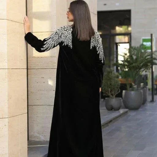 black velvet abaya with intricate white and silver embroidery on shoulders, elegant and luxurious design - black abaya