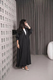 Woman wearing a free-size black linen blazer with wide fit and relaxed style indoors - free-size blazer