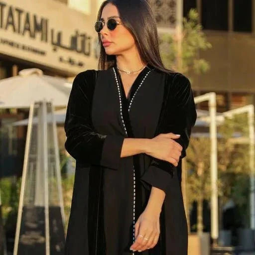 Elegant Nocta abaya with black velvet sleeves and crepe body for a sophisticated look