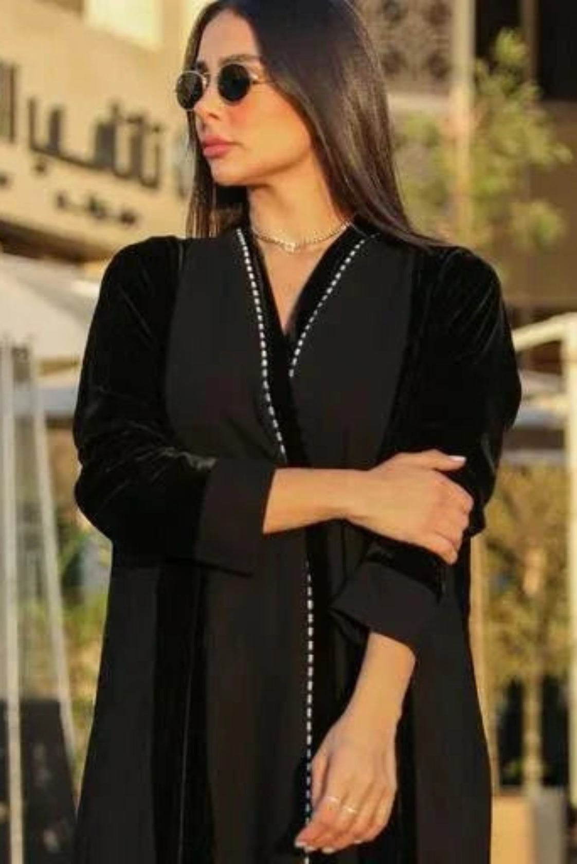 Elegant Nocta abaya with black velvet sleeves and crepe body for a sophisticated look
