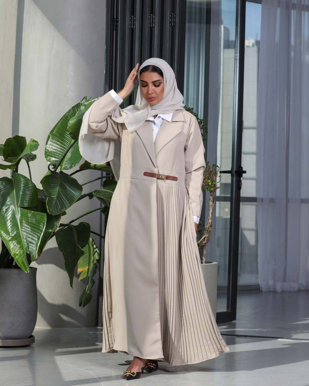 soft beige abaya with fine pleats in lightweight crepe fabric for elegant casual and formal wear