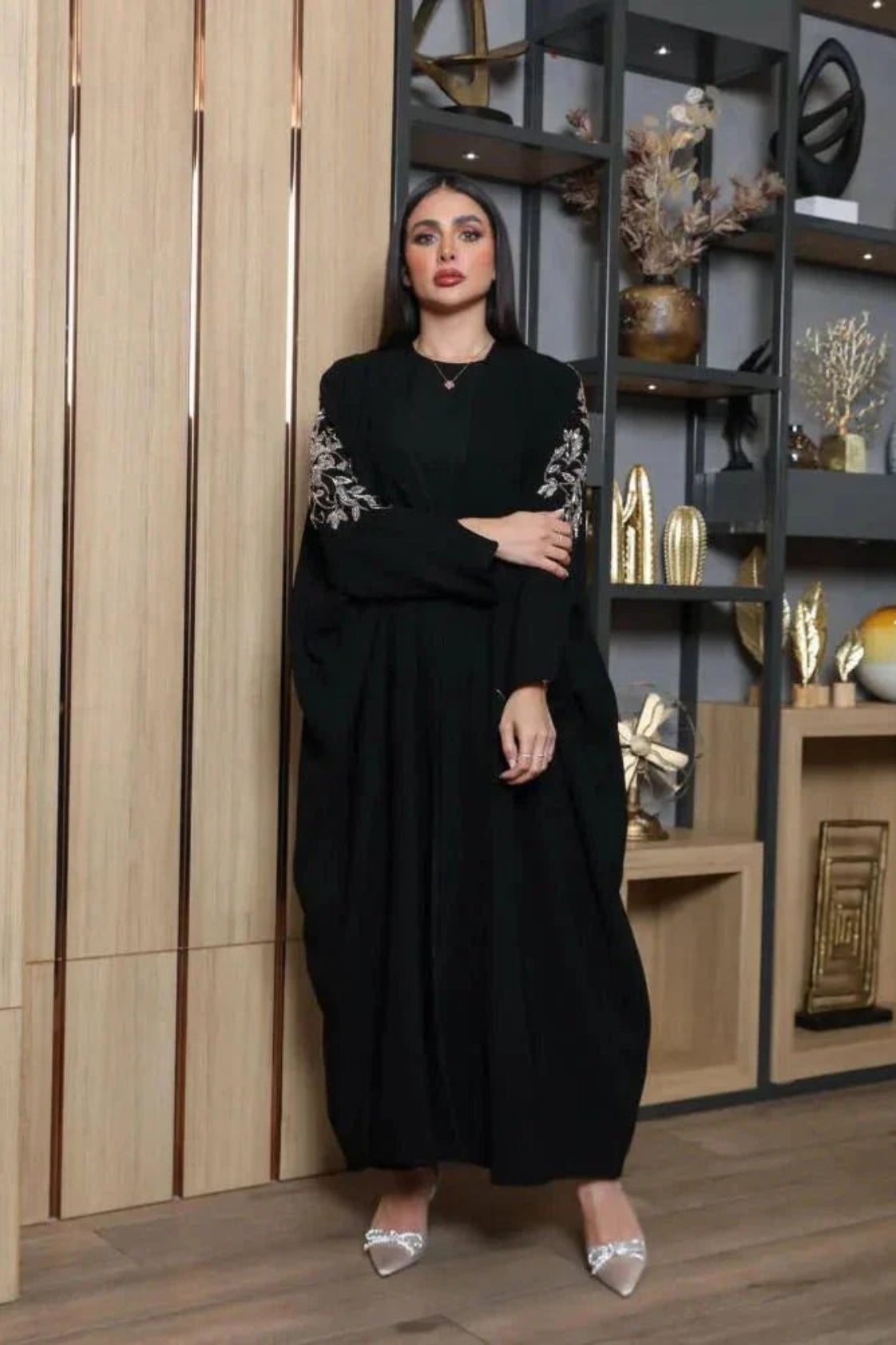 Black bisht with bronze hand embroidery on premium crepe fabric, loose fit for elegance and comfort.