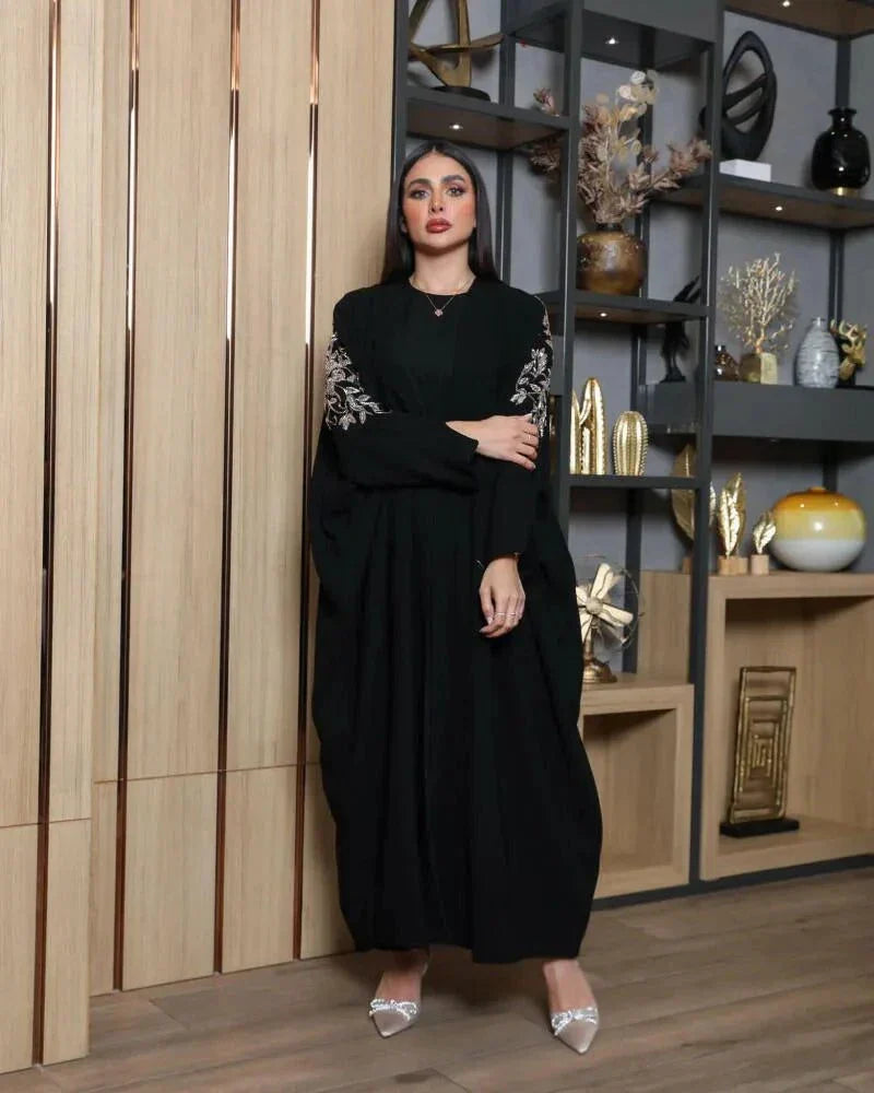 Black bisht with bronze hand embroidery on premium crepe fabric, loose fit for elegance and comfort.