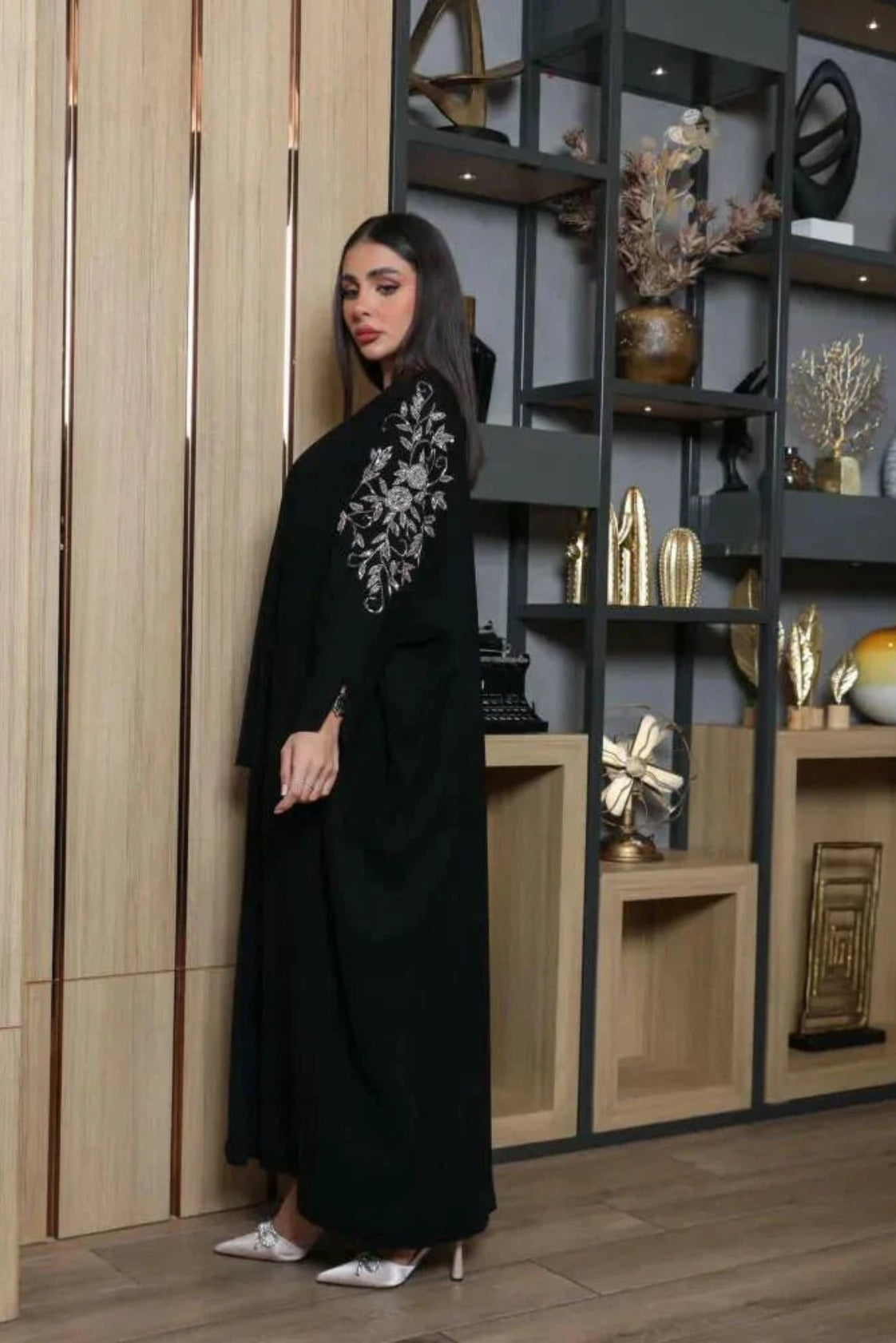Black bisht with bronze hand embroidery on premium crepe fabric, loose fit for elegance and comfort.