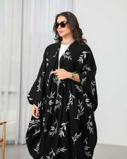 Bisht-style abaya in black with elegant white rose embroidery and varying lengths for a graceful look