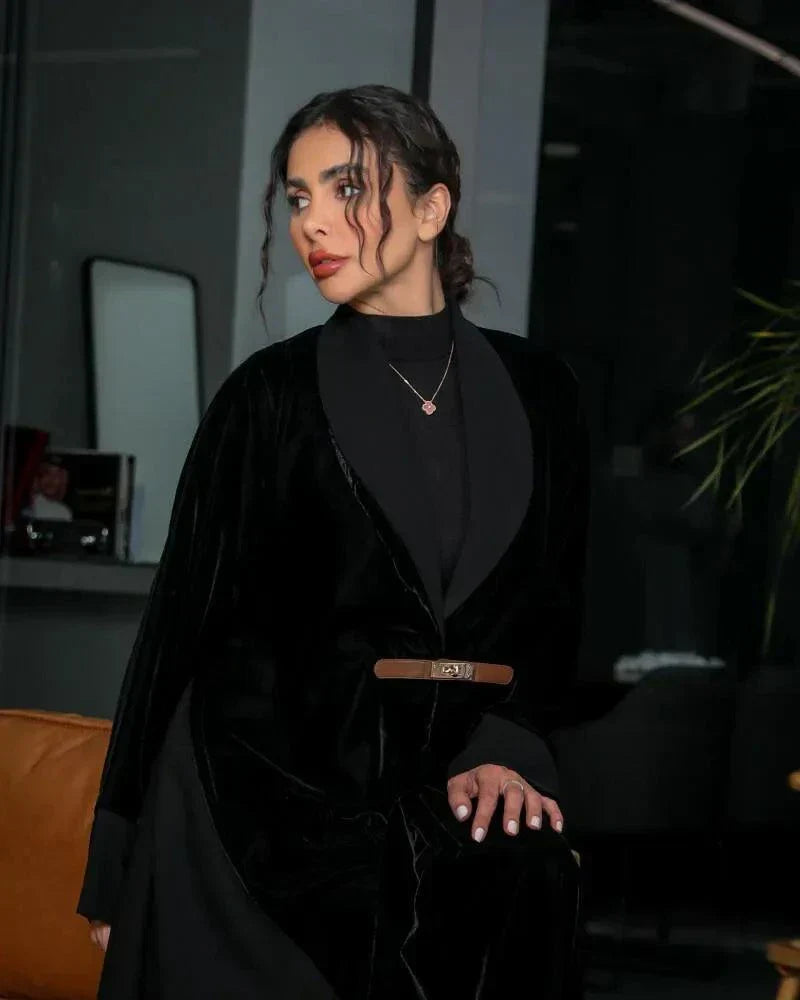 timeless black abaya with velvet panels and crepe base, blazer-style lapel, and slim waist belt for elegant evening wear