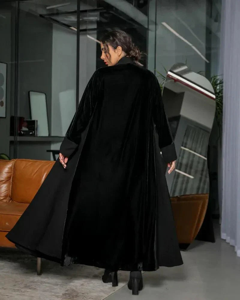 timeless black abaya with velvet panels and crepe base, blazer-style lapel, and slim waist belt for elegant evening wear
