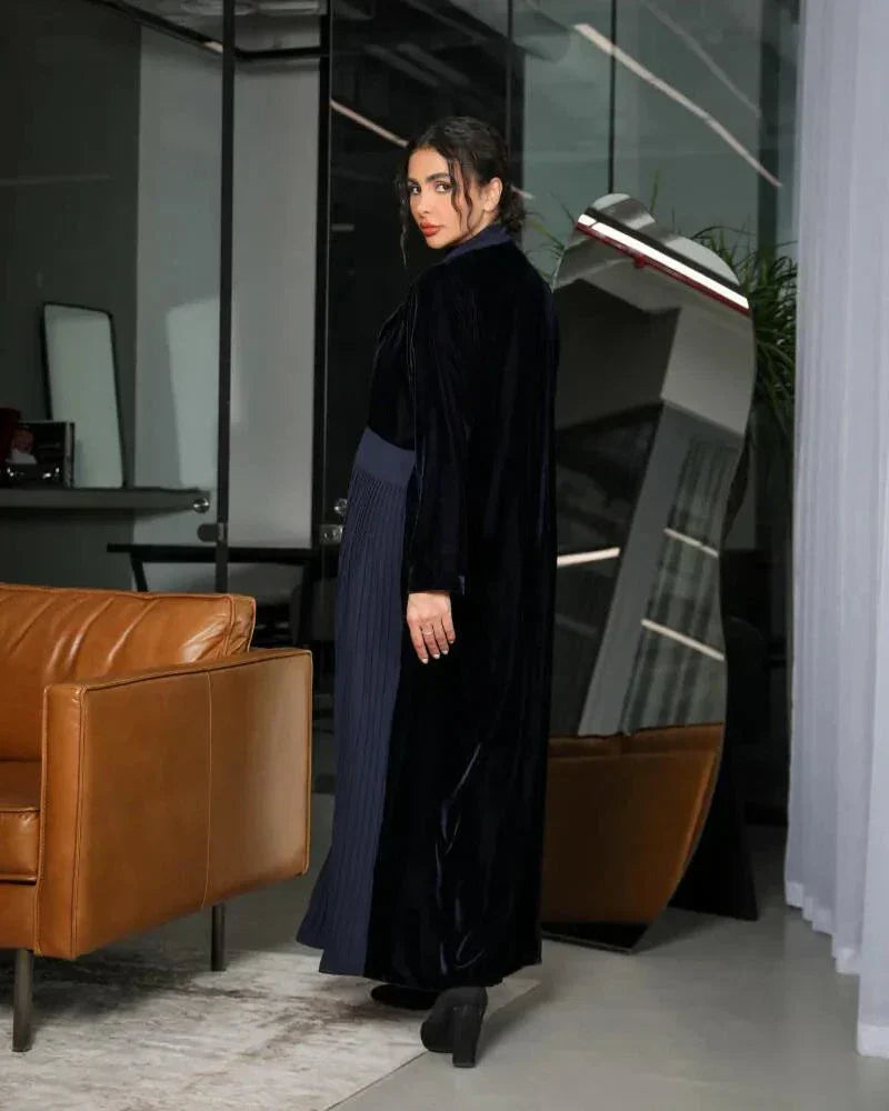 Elegant navy blue abaya with velvet blazer-style top and pleated crepe skirt, featuring a slim waist belt for formal wear
