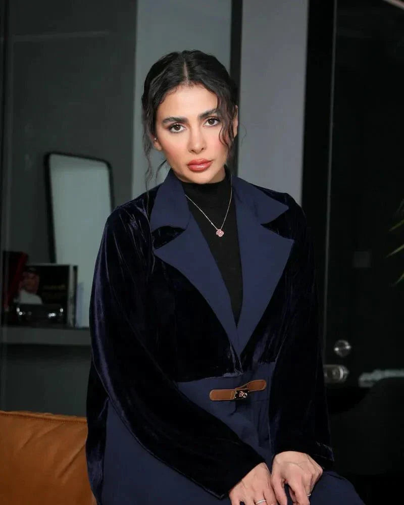 Elegant navy blue abaya with velvet blazer-style top and pleated crepe skirt, featuring a slim waist belt for formal wear