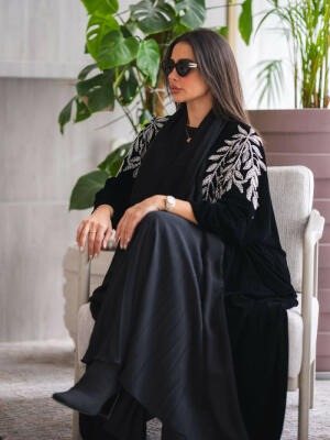 Elegant luxurious black velvet abaya with silver leaf embroidery on shoulders and sleeves