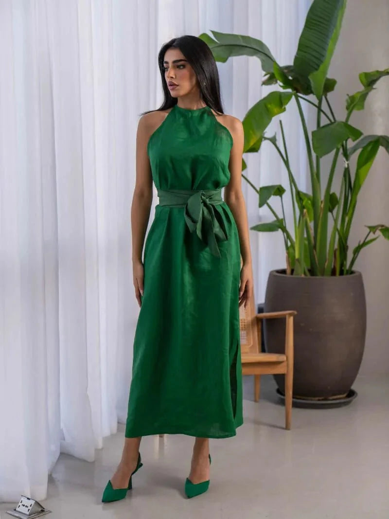 Green sleeveless linen midi dress with halter neckline and wide waist tie