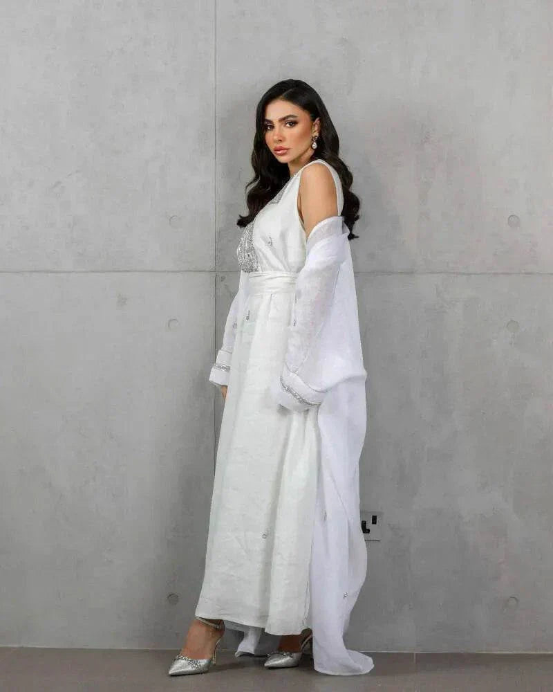 Alba white linen sleeveless top and skirt set with silver hand embroidery for elegant occasions