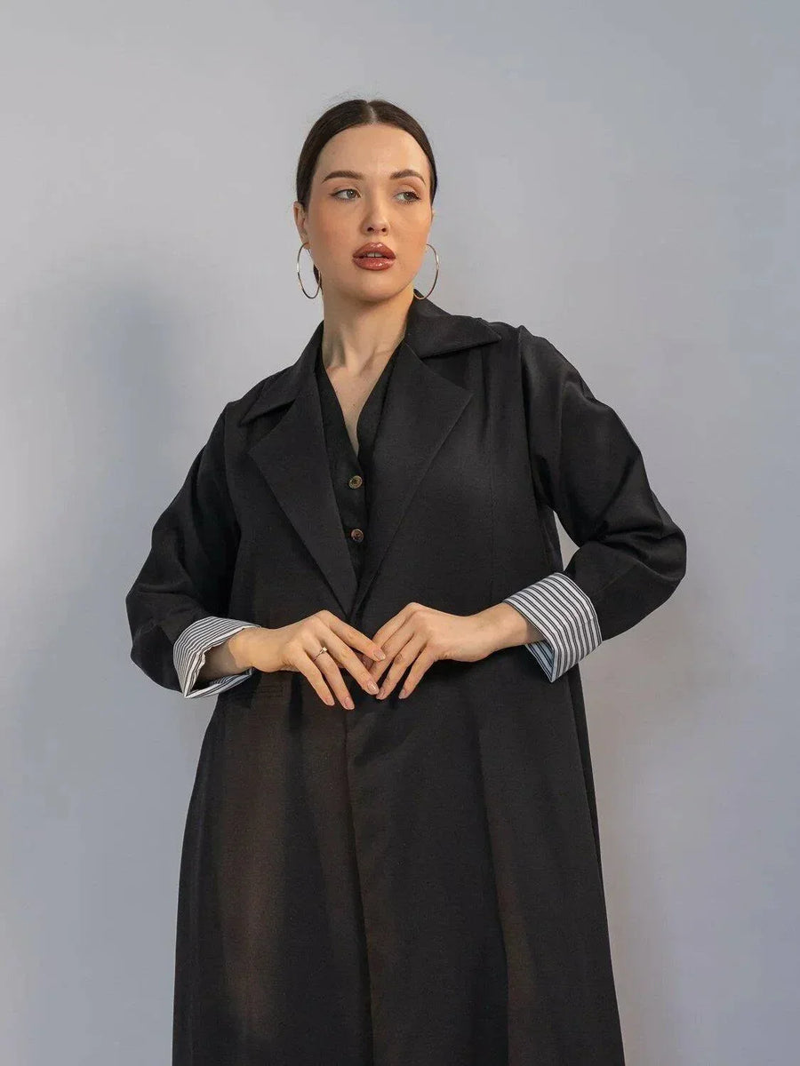 elegant black crepe abaya with structured collar, hidden buttons, and padded striped cuffs for modern chic look - black crepe abaya