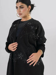 Elegant black abaya with intricate black-on-black embroidery and a soft open front design for modest, sophisticated wear
