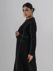 modern black crepe abaya with geometric contrast stitching and full-length silhouette