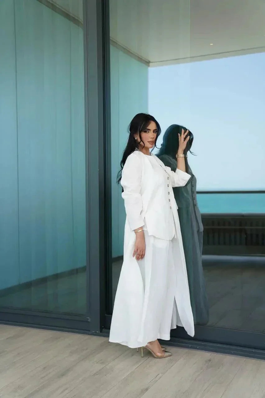 Elegant off-white linen blazer-style abaya with tailored cut and modern silhouette