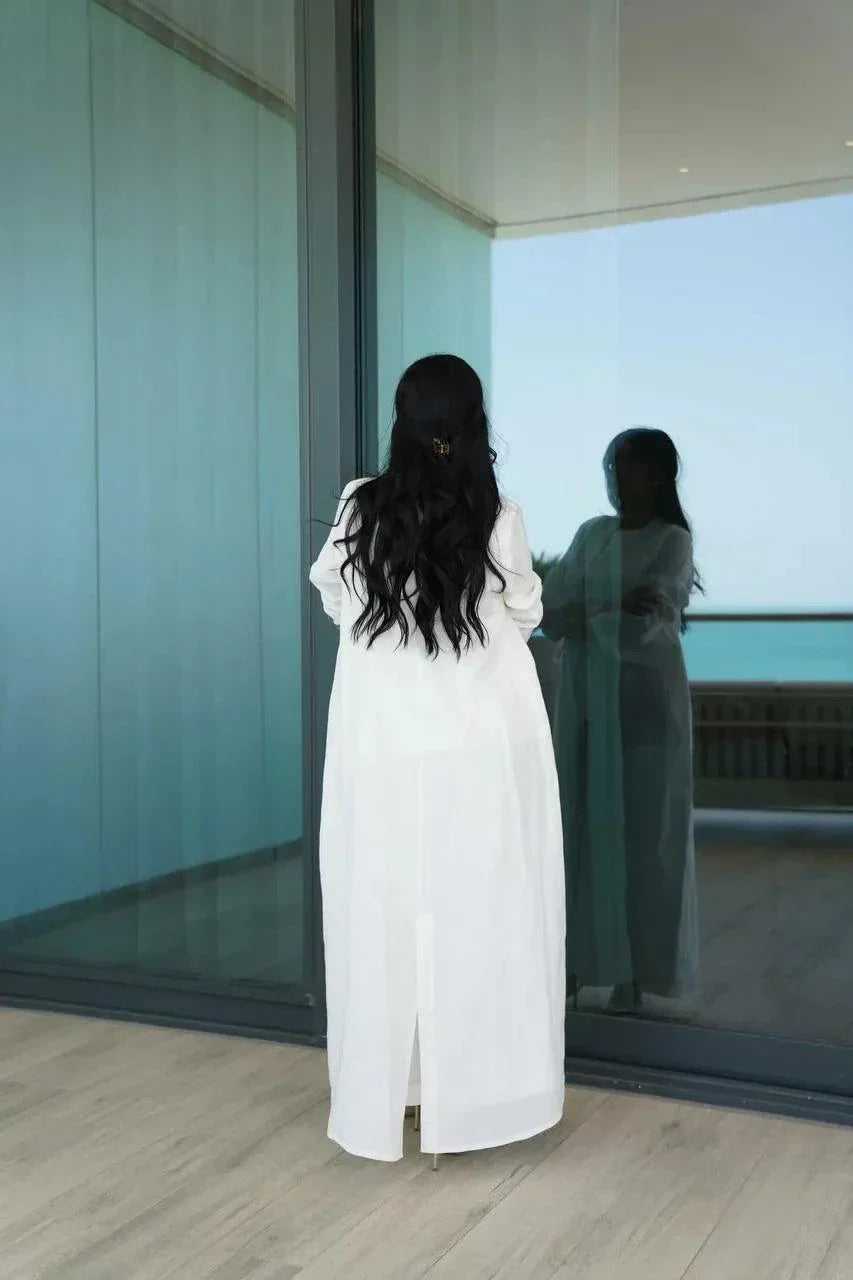 Elegant off-white linen blazer-style abaya with tailored cut and modern silhouette