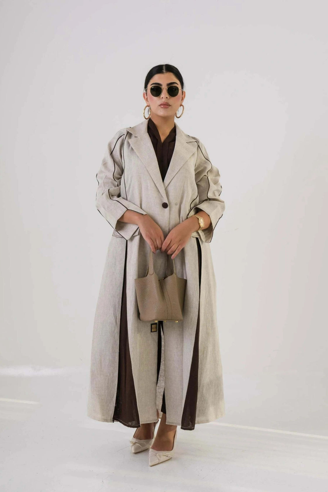Fawn beige and brown linen blazer with clean lines for smart-casual and transitional layering