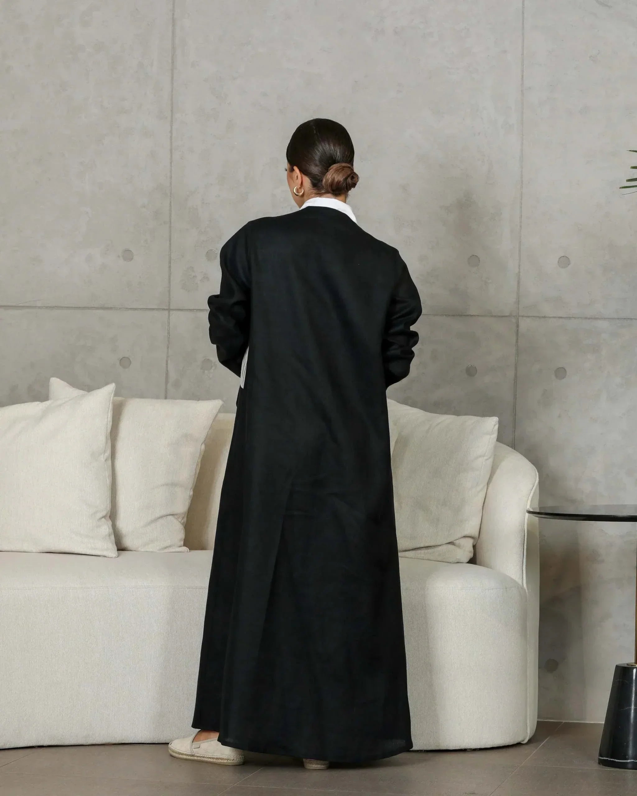 black linen abaya with beige striped panel and modern design