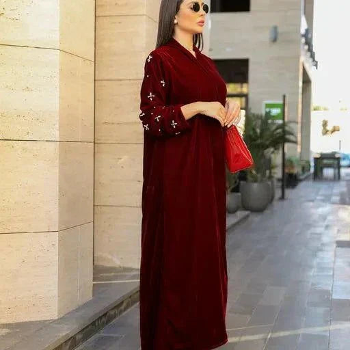 luxurious maroon velvet abaya with delicate sleeve embroidery and elegant texture