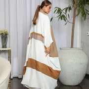 Flowy abaya with soft washed crepe fabric and subtle brown lines for casual wear