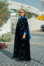 luxurious black velvet abaya with blue floral embroidery and royal blue cuffs with chiffon inner scarf