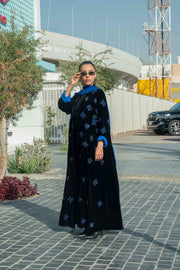 luxurious black velvet abaya with blue floral embroidery and royal blue cuffs with chiffon inner scarf