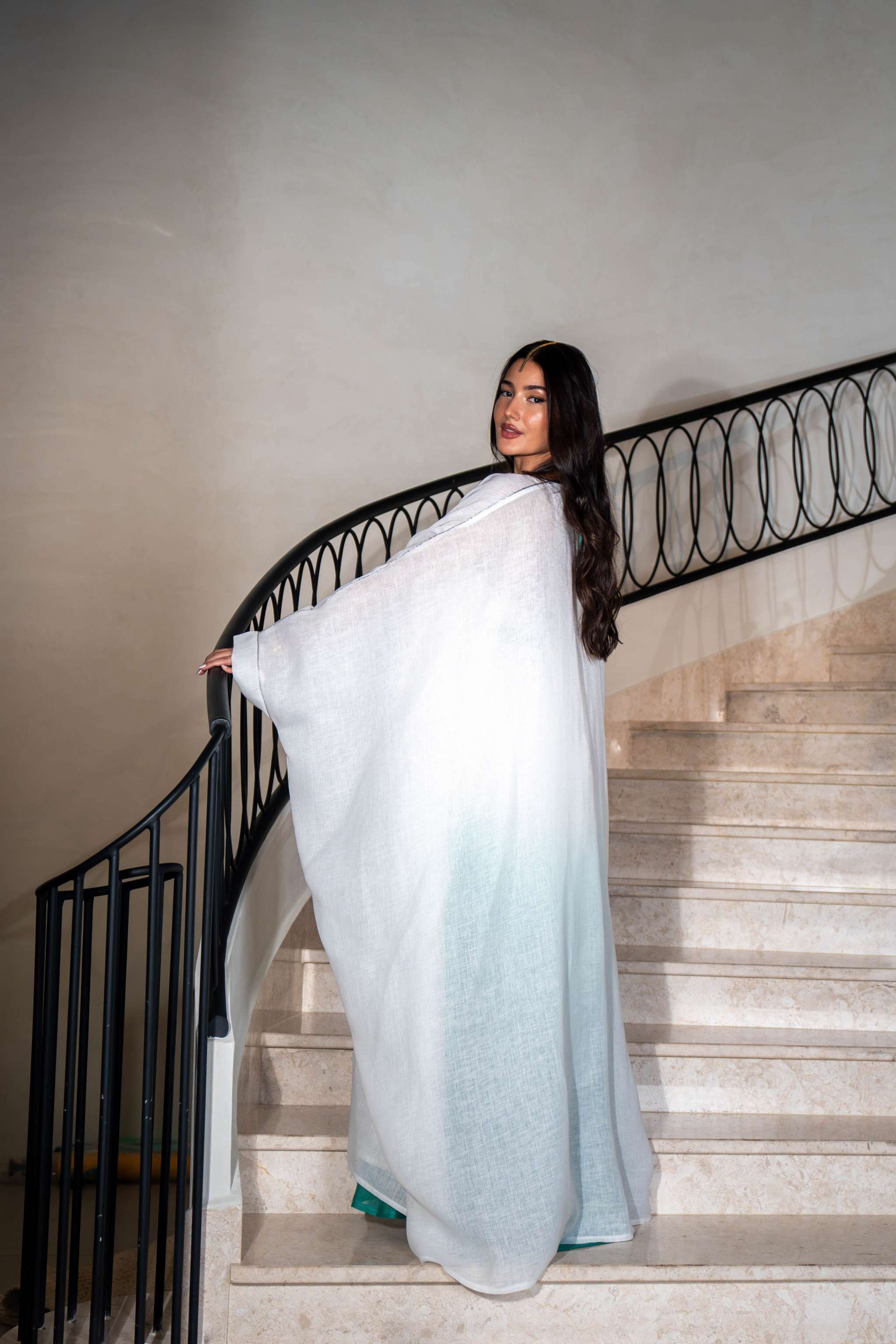 Elegant turquoise ombre dress with silver embellished center panel and flowy white embroidered bisht ideal for formal occasions