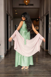 soft pastel green one-piece dress with floral embroidery and flowing blush pink cape sleeves for spring and summer