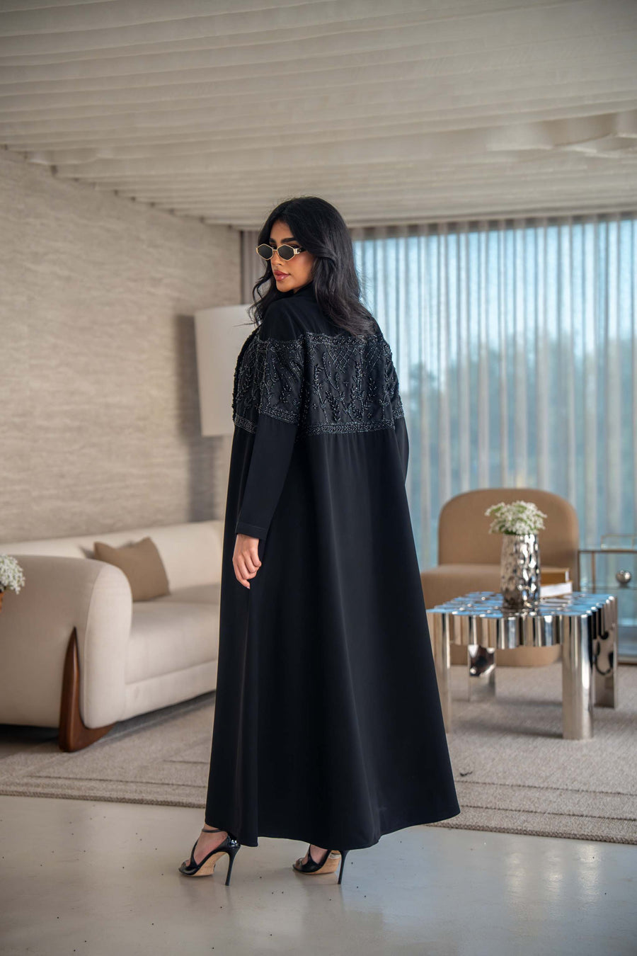 luxurious blend of crepe and satin fai abaya with intricate embroidery and soft drape